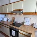 Title E Title - Oura Apartmán