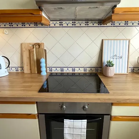 Title E Title - Oura Apartment