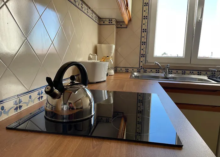 Title E Title - Oura Apartment