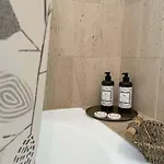 Title E Title - Oura Apartment